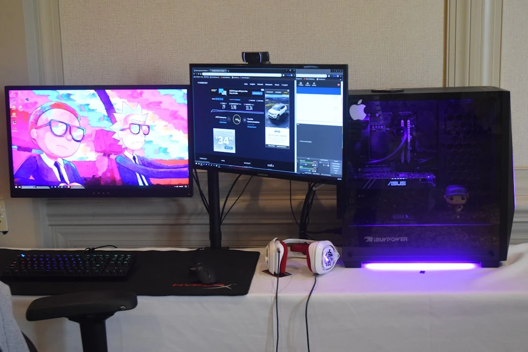 Gaming setup with screens showing online tennis match and codes.